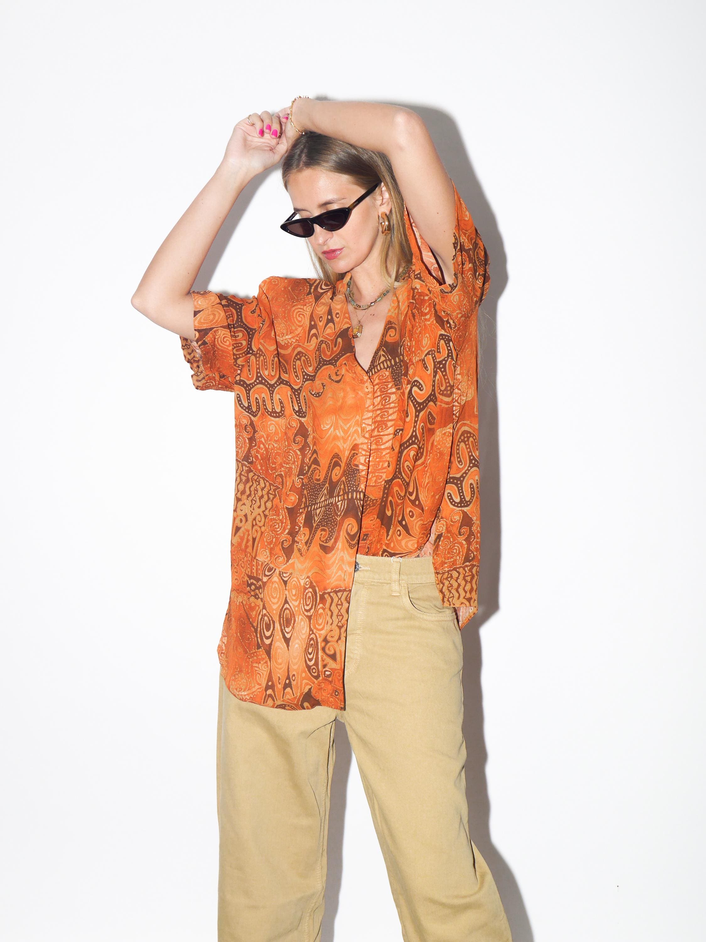 VINTAGE Viscose Orange Abstract Oversized Short Sleeve Blouse With Opalescent Buttons And Shoulder Pads From The 1980s By Domino