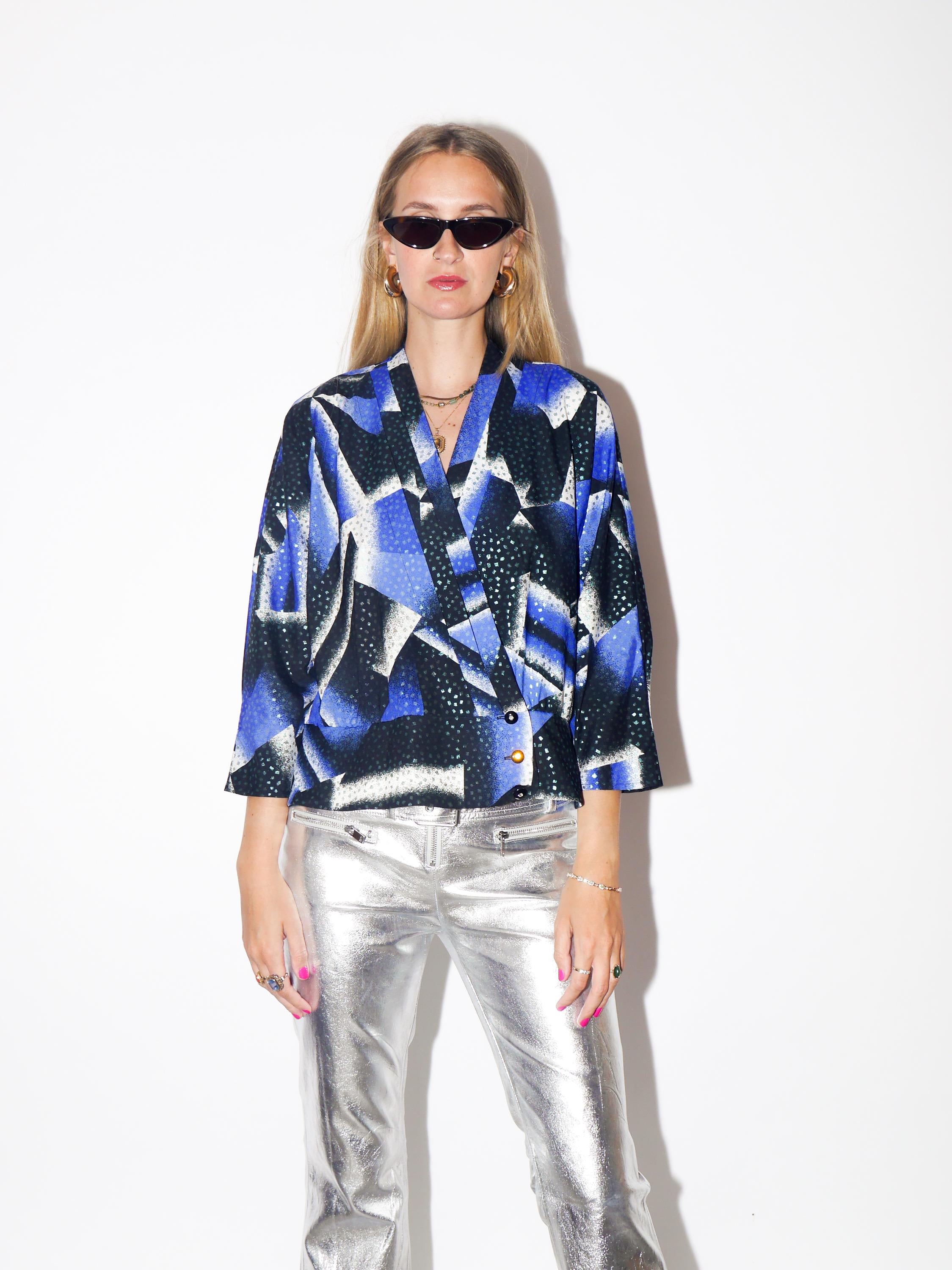 VINTAGE Cobalt Blue Black And White Asymmetric Peplum Blouse With Glitter Pattern From The 1980s By Frankenwalder