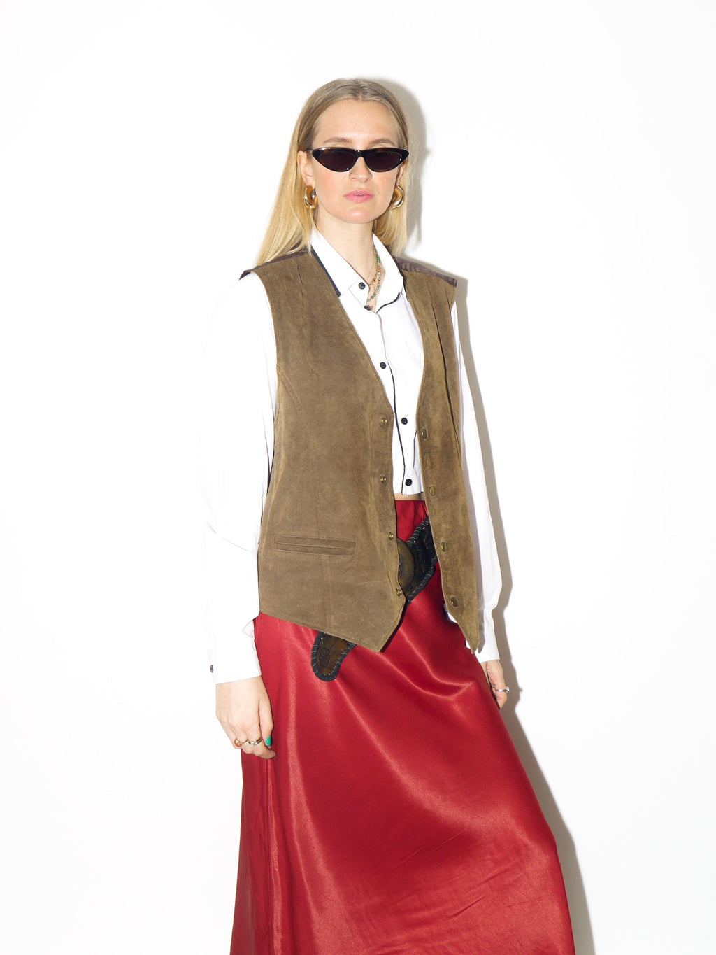 VINTAGE bronze suede vest from 1990s in light brown leather in oversize fit
