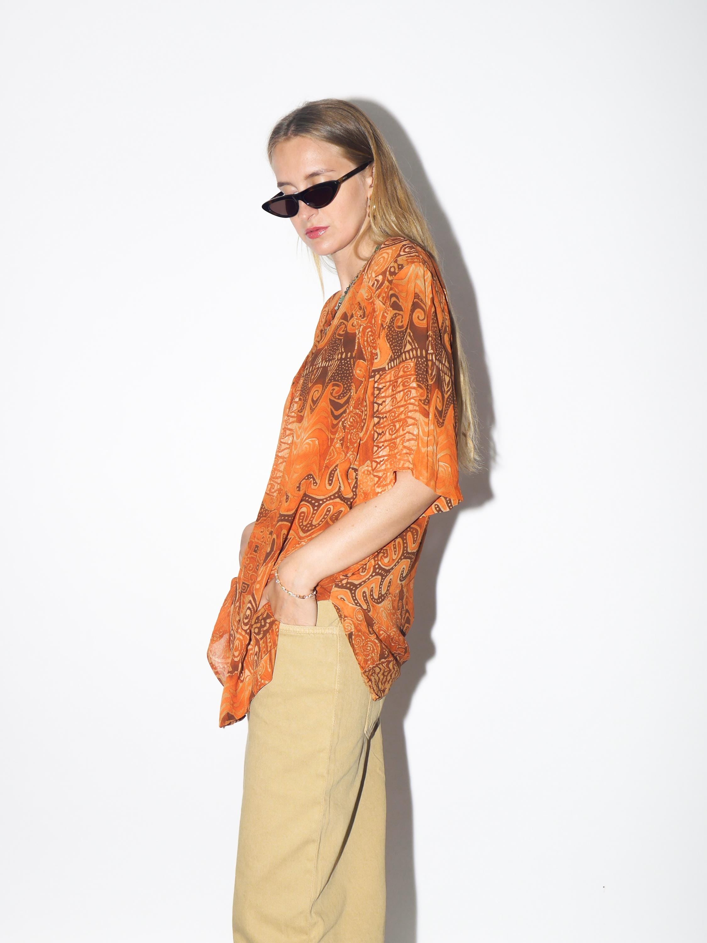 VINTAGE Viscose Orange Abstract Oversized Short Sleeve Blouse With Opalescent Buttons And Shoulder Pads From The 1980s By Domino